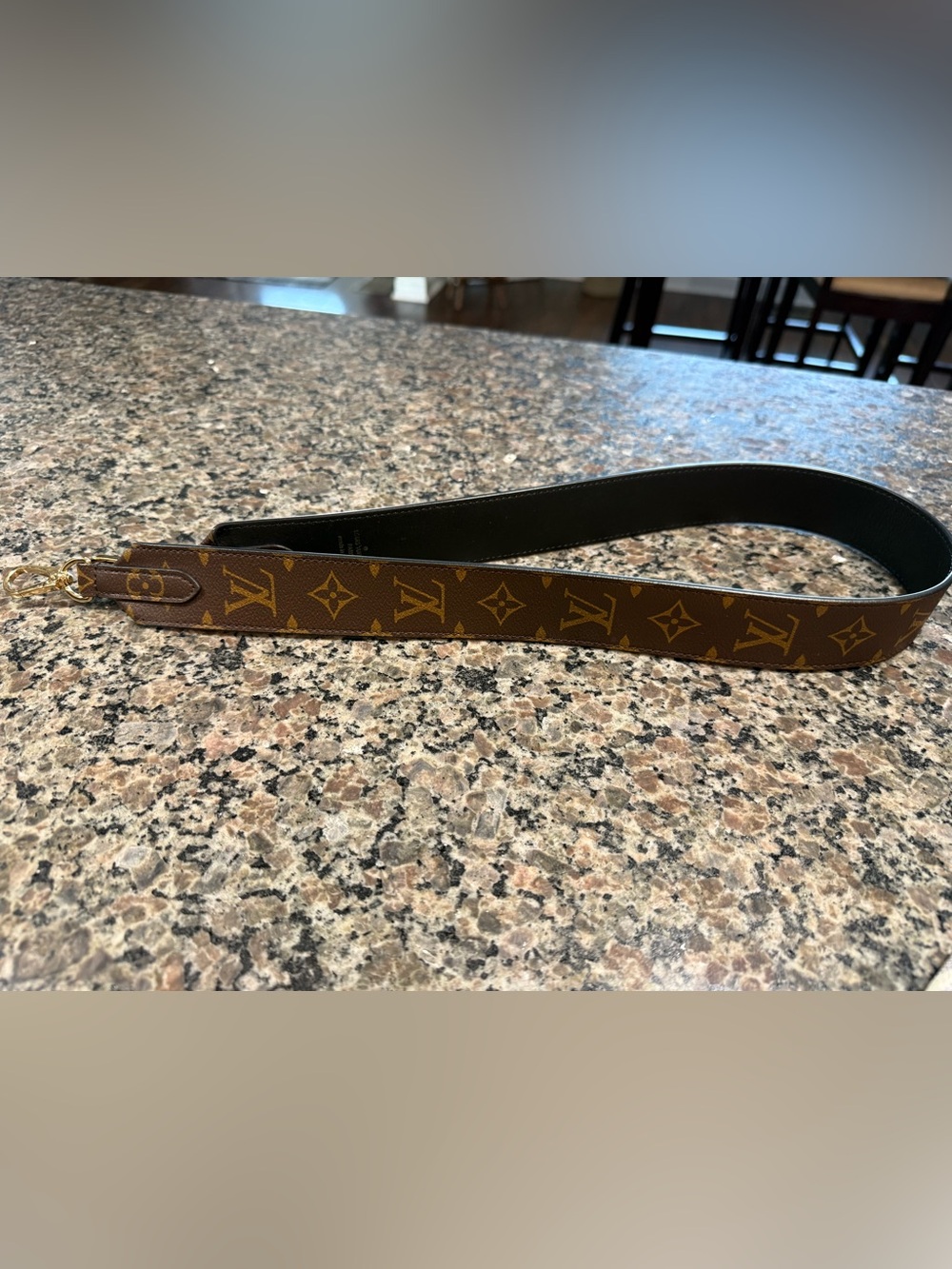 Authentic Louis Vuitton Brown Monogram Canvas strap with Black Leather Reverse